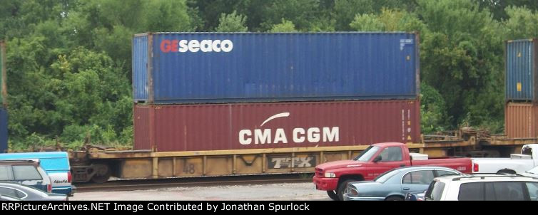 Unknown TTX mid-platform car with two containers